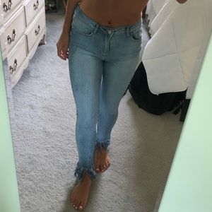 Fringed blue jeans